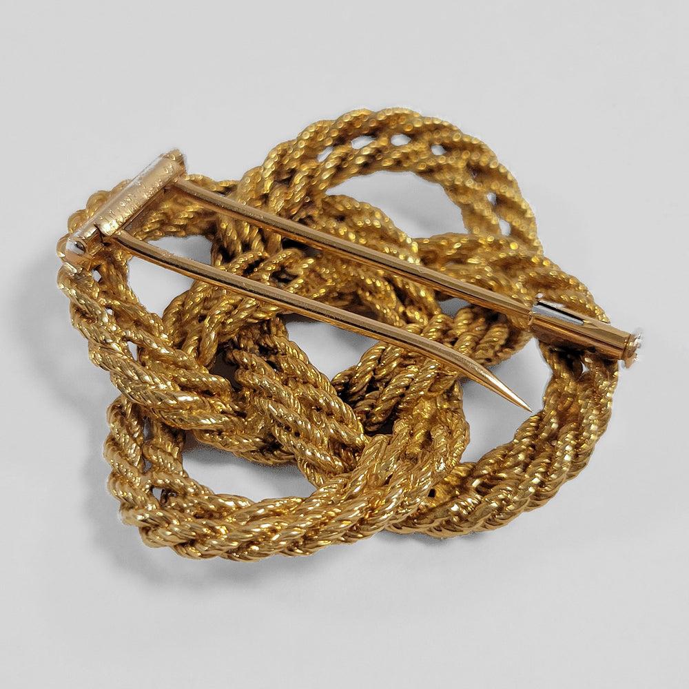 
                      
                        Macklowe Gallery Tiffany & Co. France Gold Knot Brooch
                      
                    