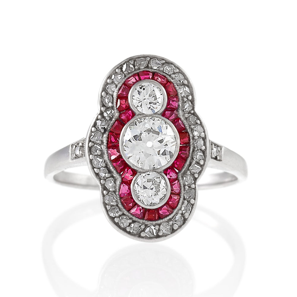 
                      
                        Macklowe Gallery Ruby and Three-Stone Diamond Shield Ring
                      
                    